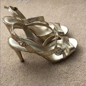 Gold sling back heels